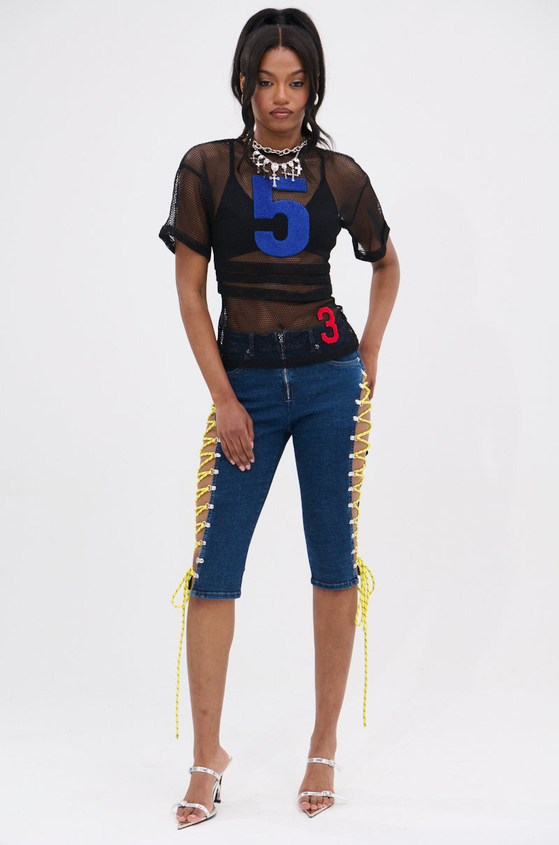 CUTE AS CAN BE LACE-UP DENIM CAPRI