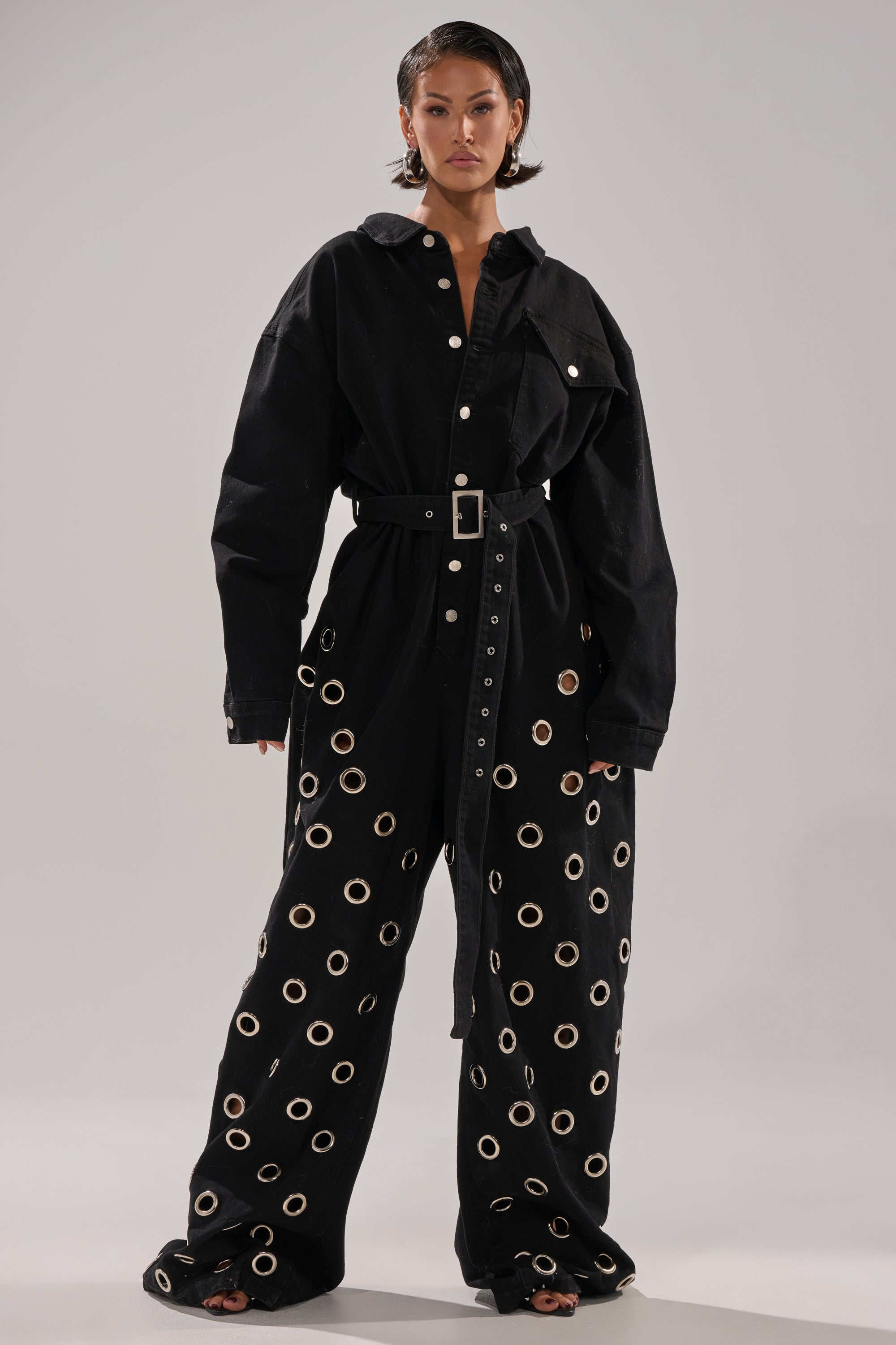 PLAY YOUR CARDS RIGHT DENIM JUMPSUIT WITH GROMMETS