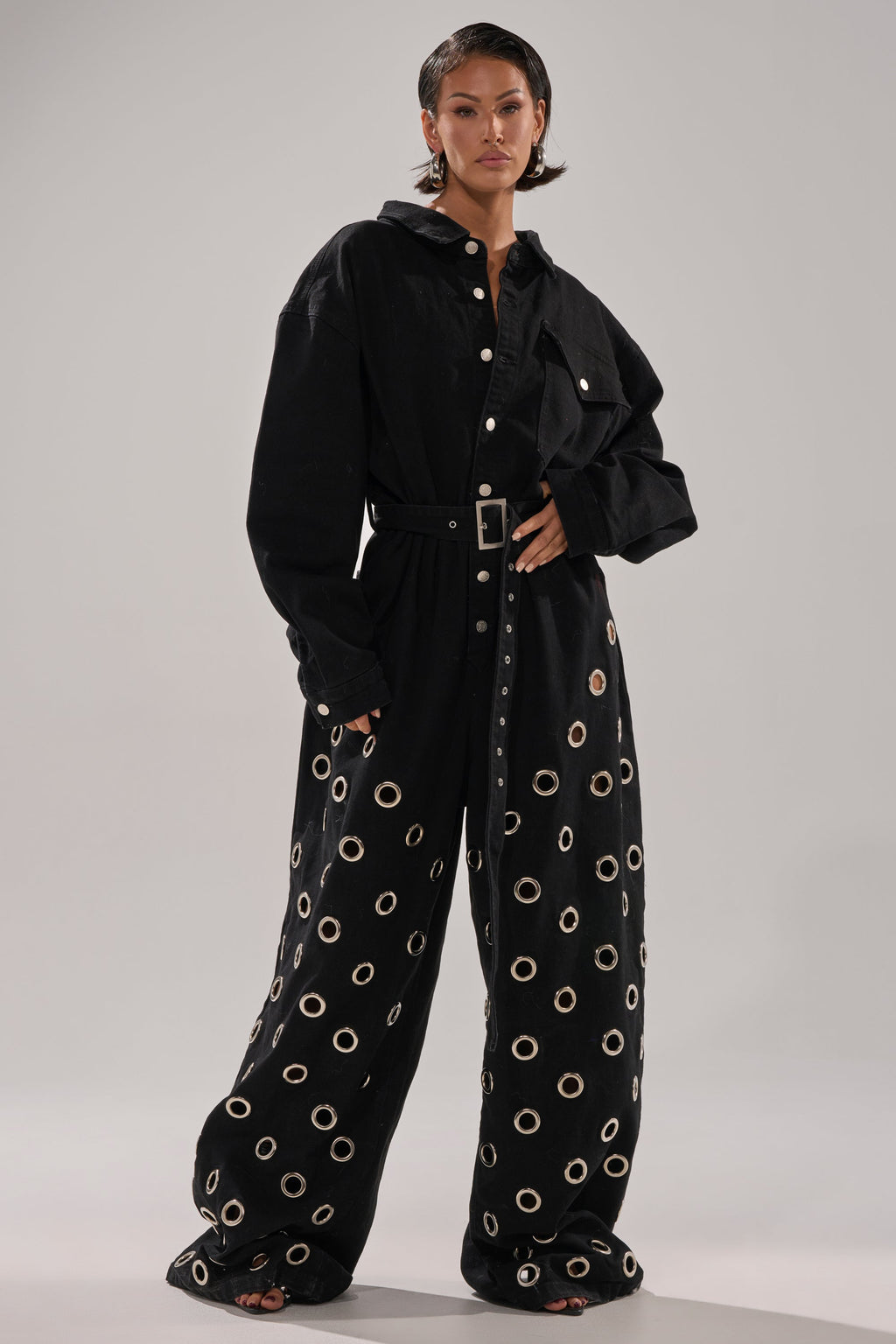 PLAY YOUR CARDS RIGHT DENIM JUMPSUIT WITH GROMMETS