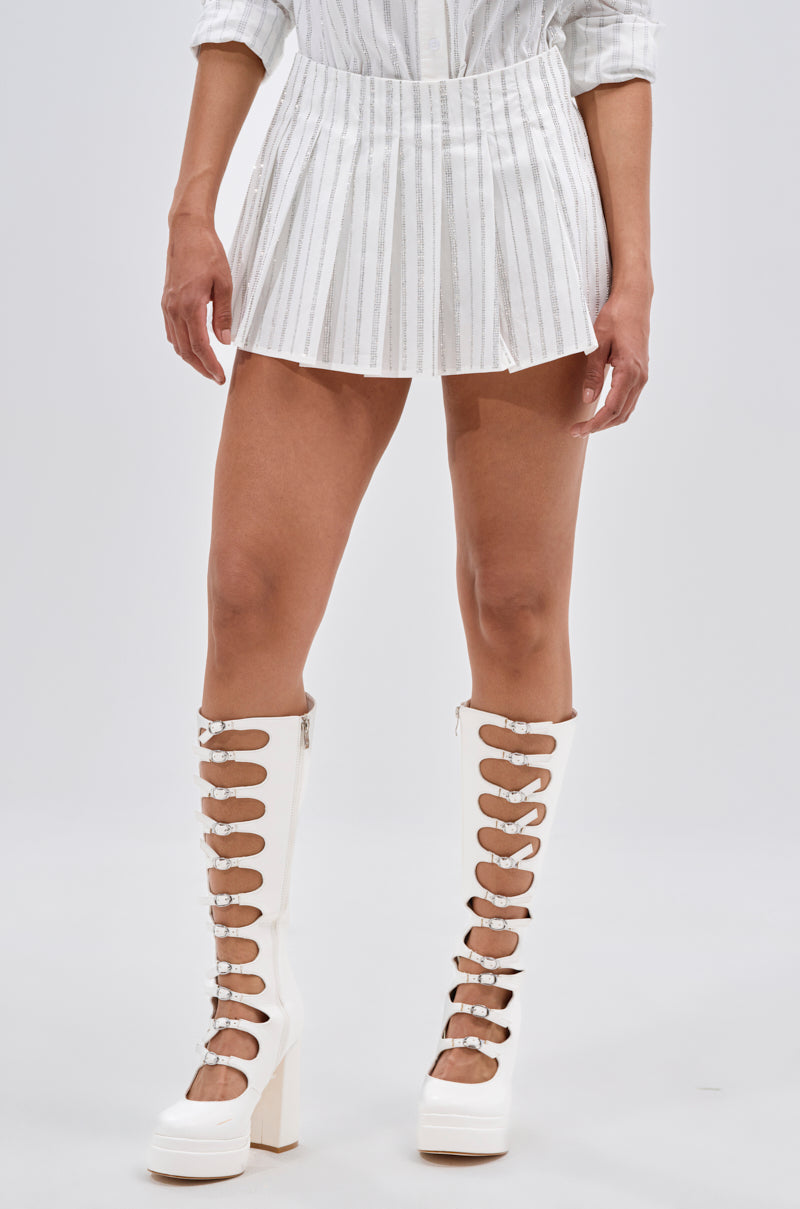 ONTO THE NEXT EMBELLISHED PLEATED MINI SKIRT IN WHITE