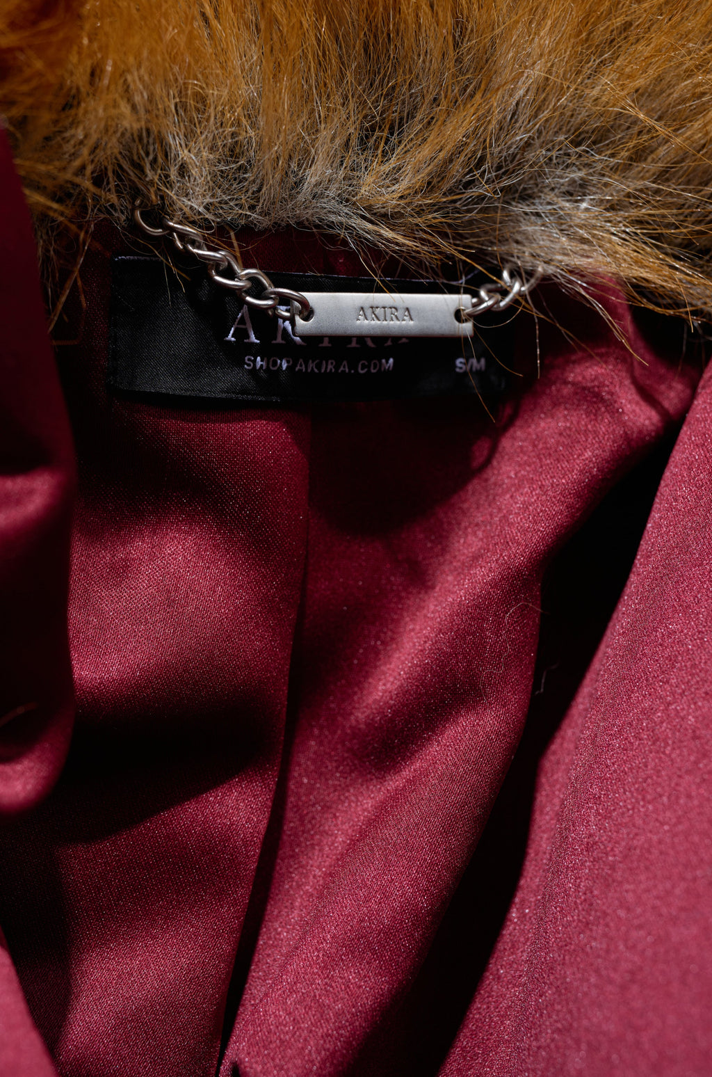 ALAIA STRIPED FAUX FUR