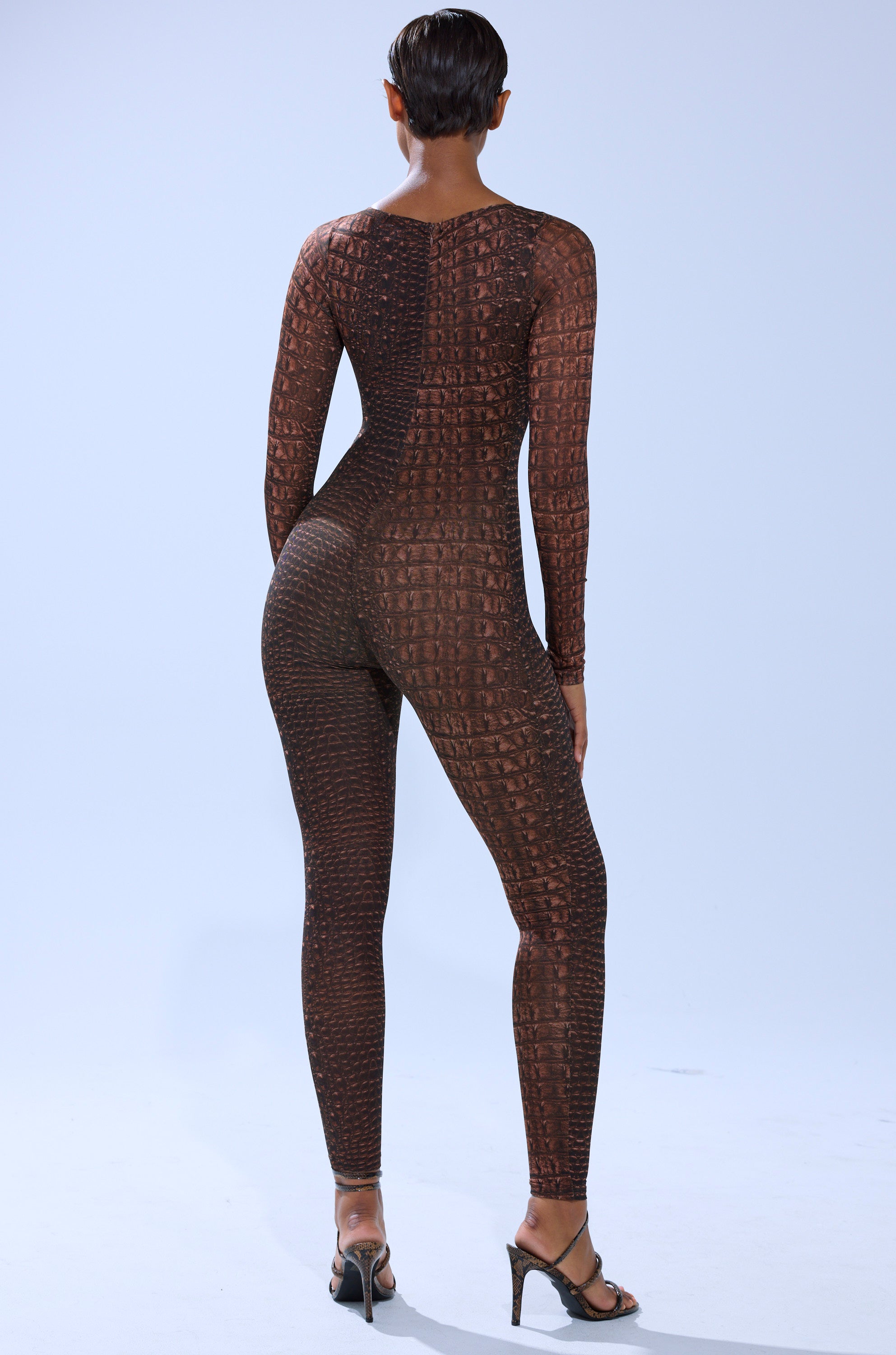 TRY AND GET ME SNAKE MESH JUMPSUIT