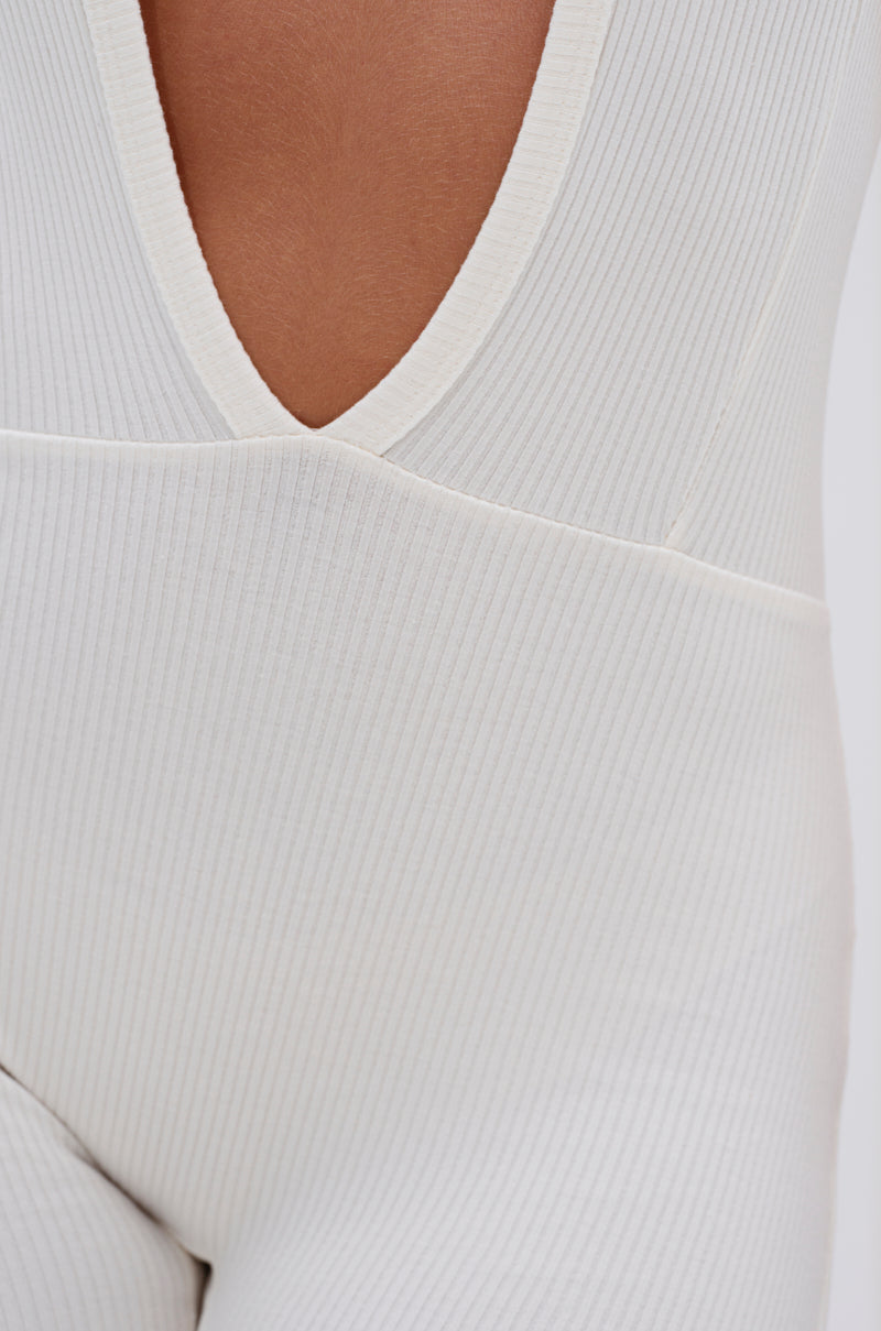 MIXED MESSAGES PLUNGING JUMPSUIT