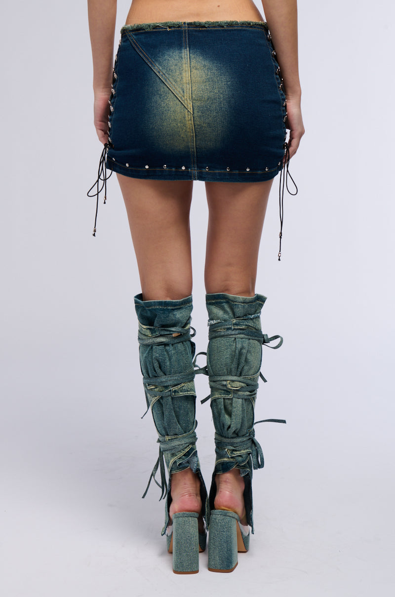 UNBOTHERED DISTRESSED DENIM MINI SKIRT