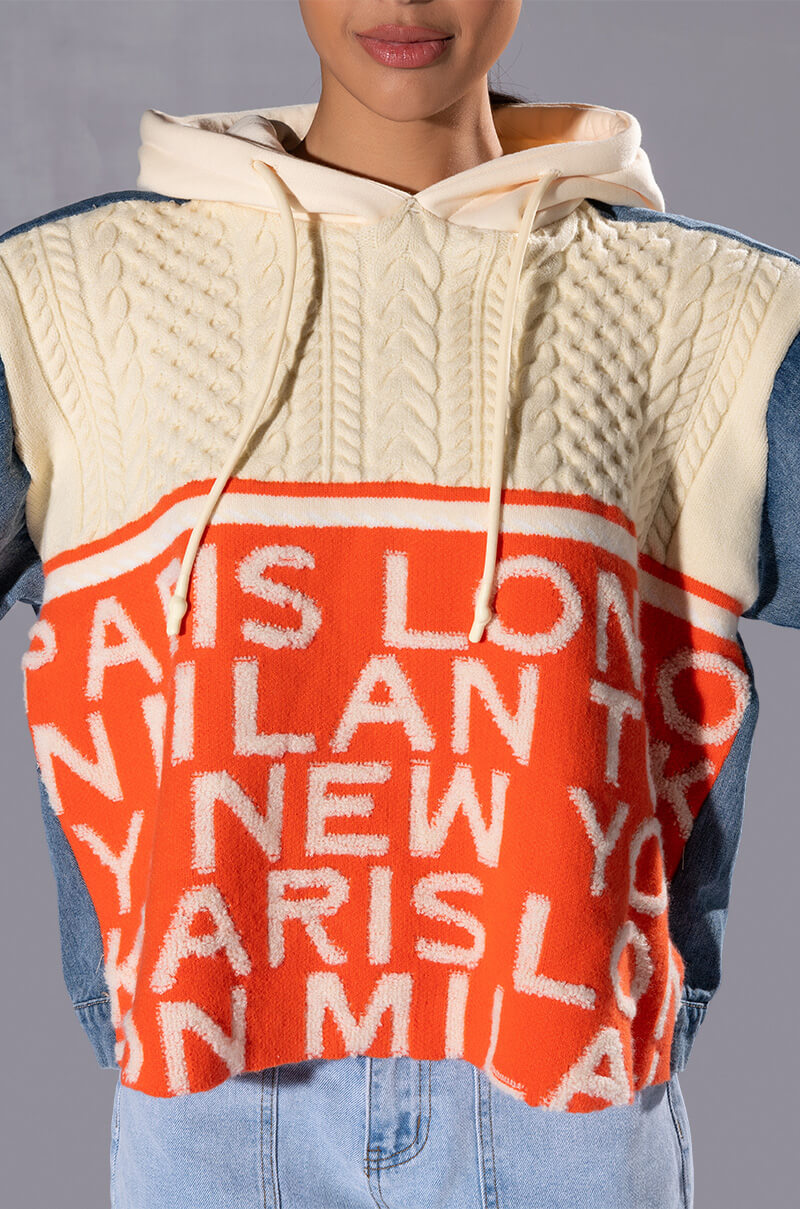 WORLD TRAVELER DENIM DETAIL SWEATER